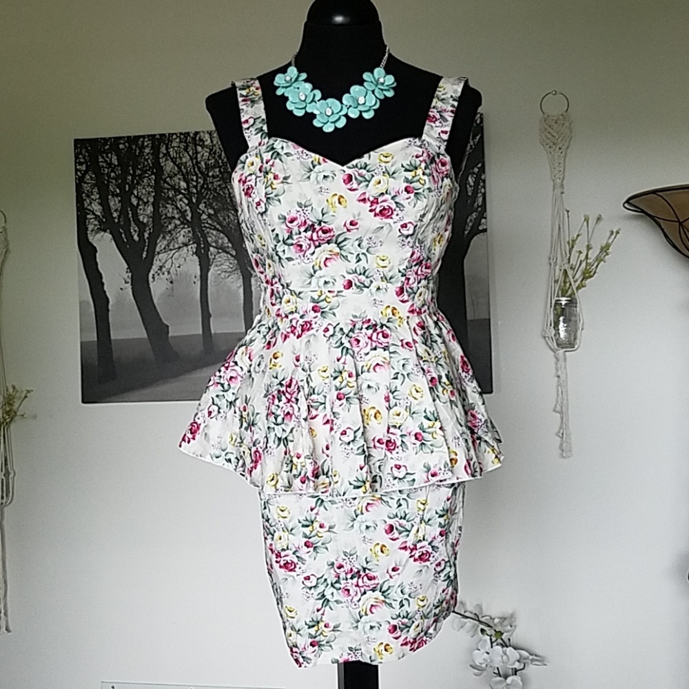 Paprika strappy peplum dress.